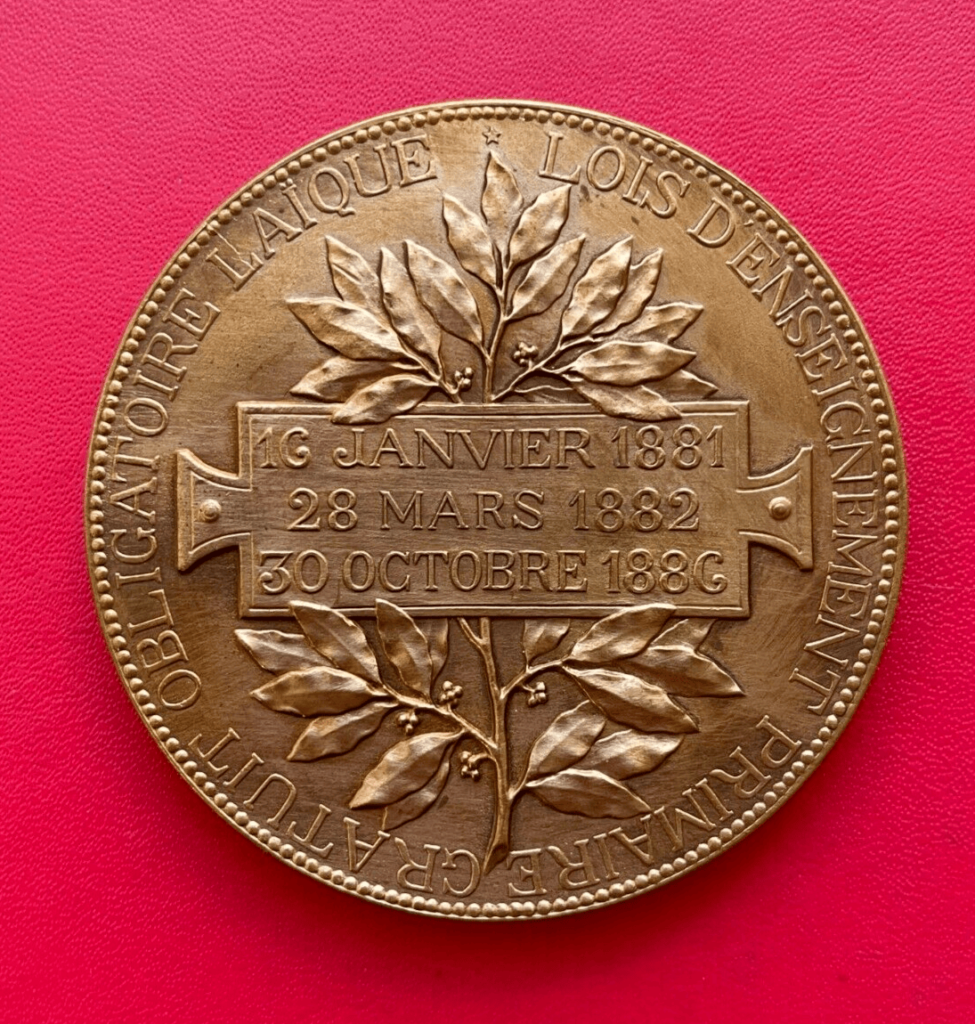 Belle médaille en bronze Lois d'enseignement primaire gratuit obligatoire Laique